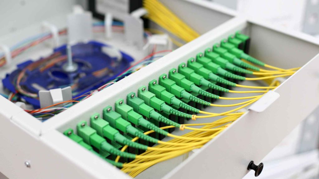 Fiber optic cables installed neatly in a cabinet for fiber to the home internet service FTTH